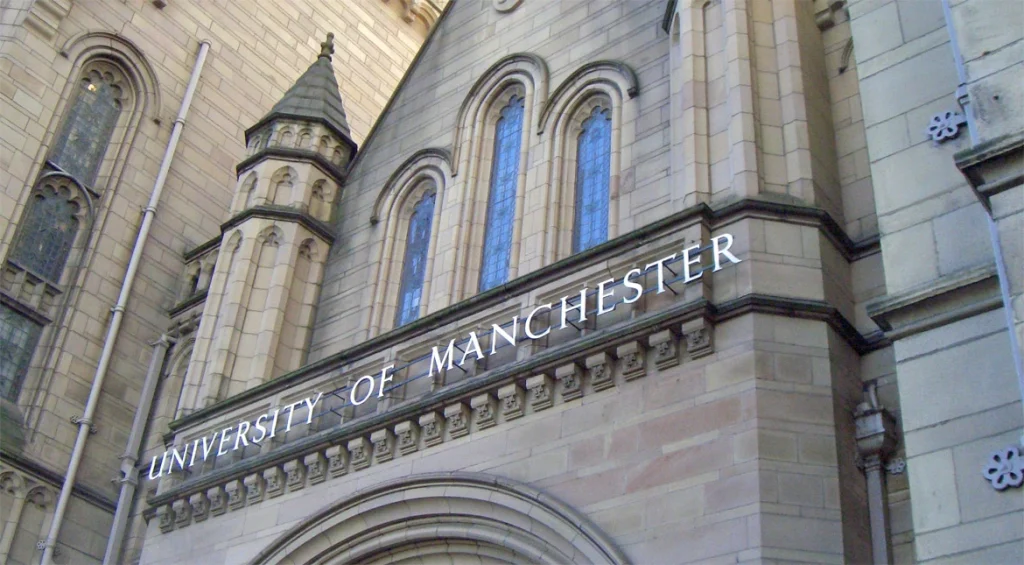 Photo of University of Manchester sign on campus building