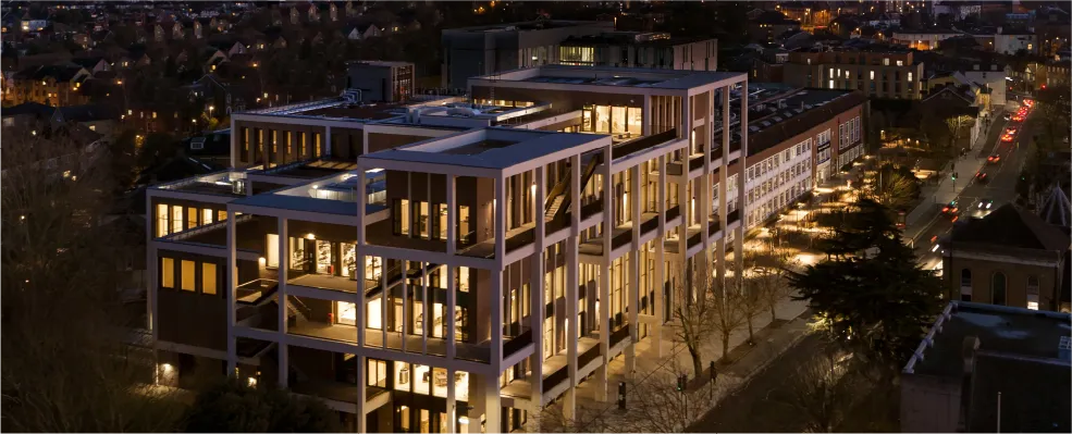 Kingston University campus building at night